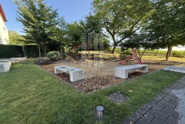 Appartement de 5 pièces au rez-de-chaussée avec jardin privatif